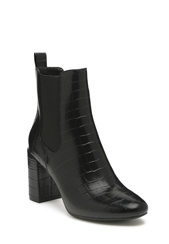 Front angle view of black Briony Block Heel Ankle Boots in patent vegan leather with round toe.