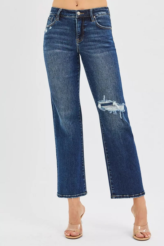 Jenna High Rise Crop Slim Straight Jeans styled with heels for casual denim look.