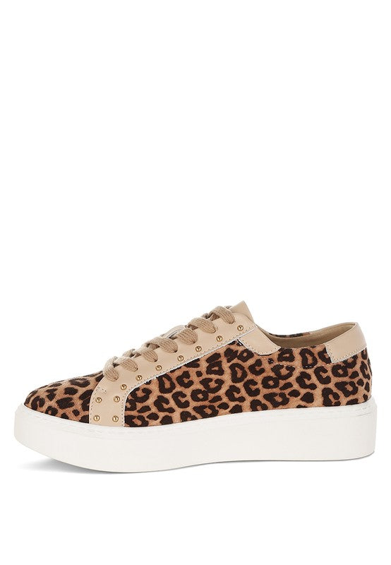 Beige leopard print flatform sneakers styled with casual outfit, perfect for everyday wear.