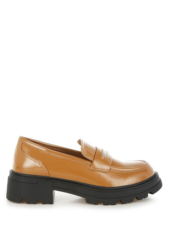 Lateral view of Tan Gleam Stride Chunky Loafers with metallic strap detail and chunky sole.