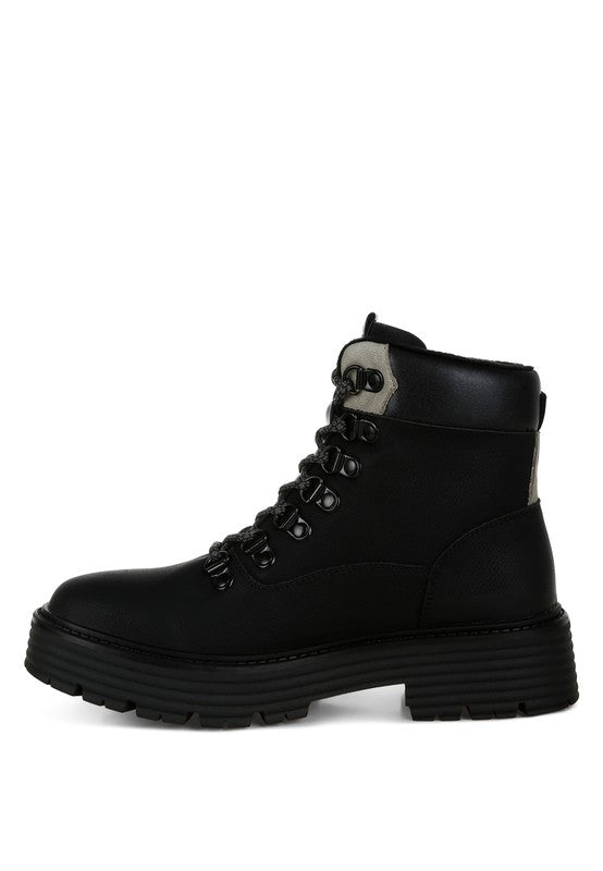 Side view of Black Boskoff Lace-Up Chunky Ankle Boots with platform heel, lace-up detail, and durable sole.