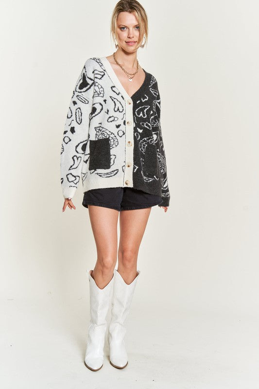 Full body view of charcoal Dafni Heart Paisley Cardigan showing oversized fit.