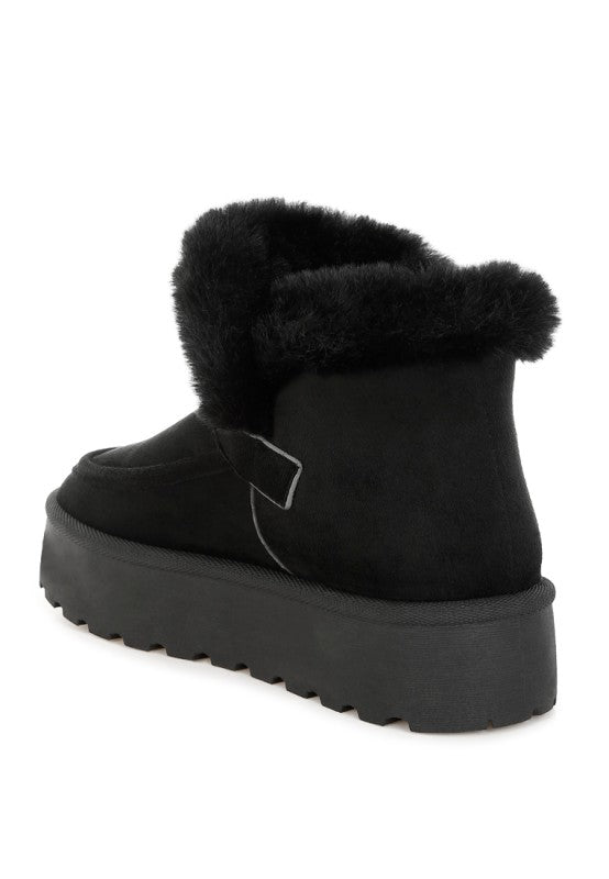 Black Linka Boots highlighting plush cushioned insole and supportive lug sole.