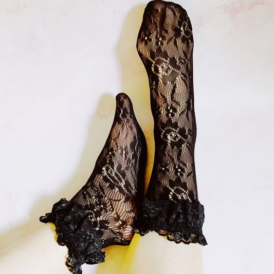 Woman wearing black 80’s Lace Socks styled with classic lace design and vintage ankle detail.