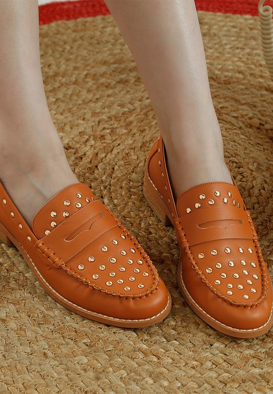 Front angle of Tan Oglavia Studded Leather Loafers showing round toe and block heel.