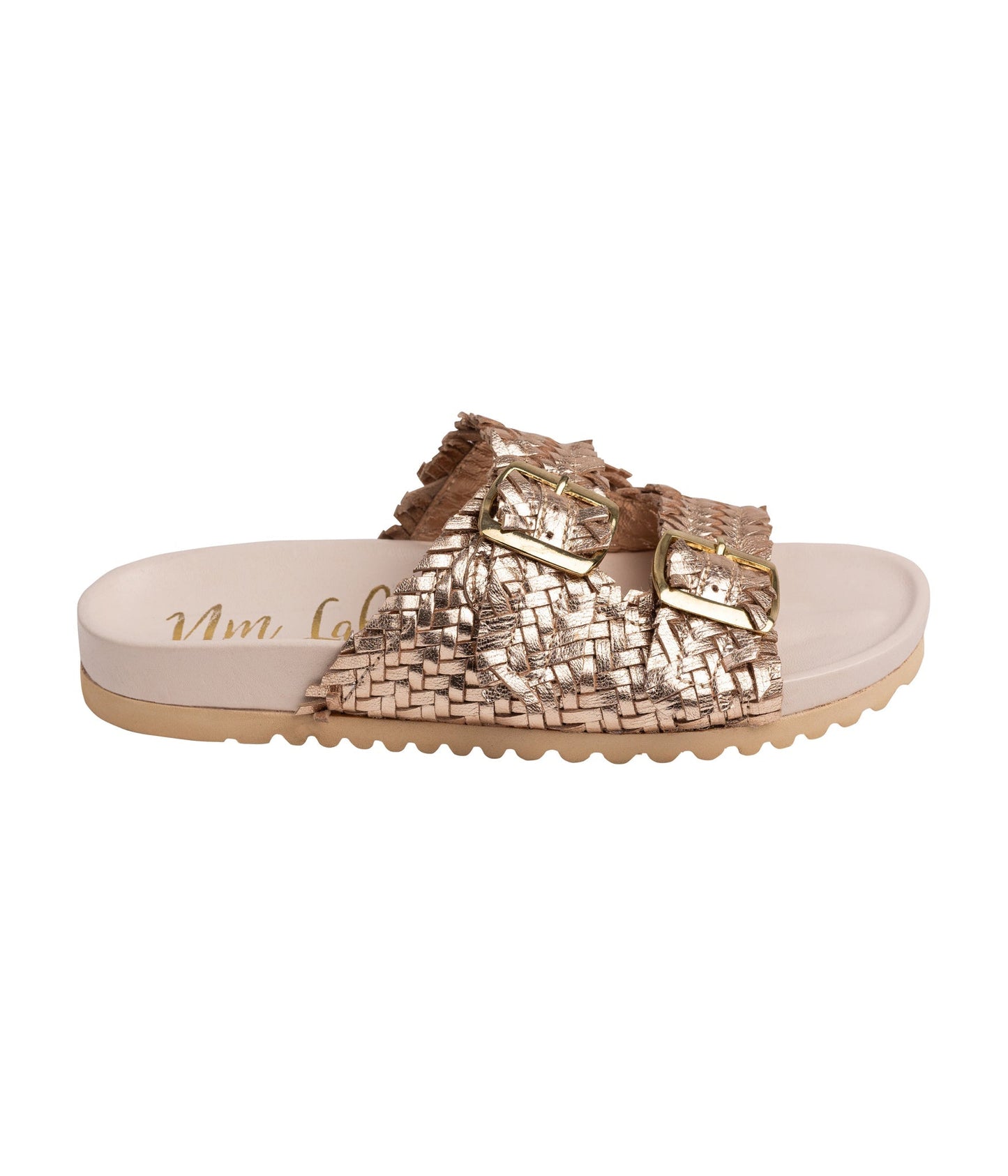 Angled side detail of champagne woven leather straps and cushioned footbed.