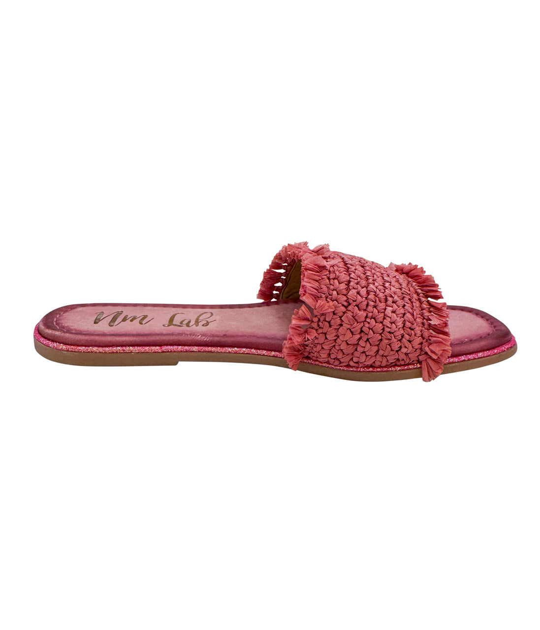Side view of Juana Pink Woven Slide Sandals with flat sole and subtle glitter trim.