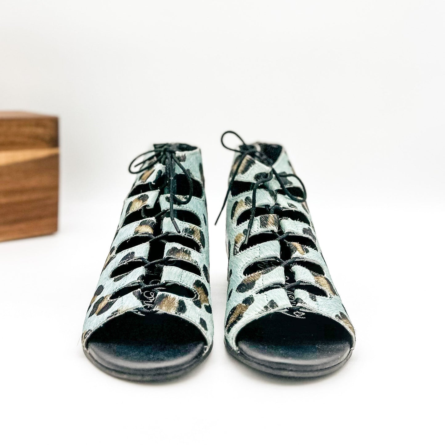 View of Nola Teal Leopard Sandals highlighting lace-up fit and gladiator-inspired look.