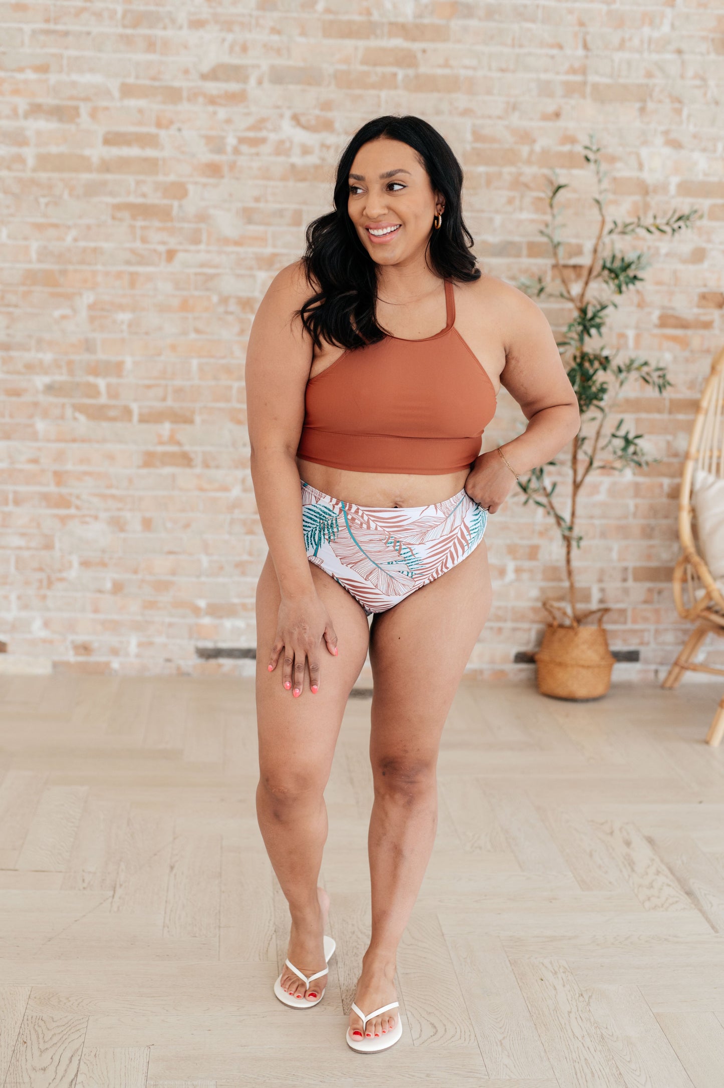 Tahiti Tropical Print High-Waisted Swim Bottoms in white with green and caramel print, featuring a cheeky fit and full lining for comfort and style.