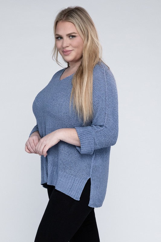 Periwinkle plus size crew neck sweater with a loose fit, side slits, long sleeves, and a cozy knit fabric for warmth.