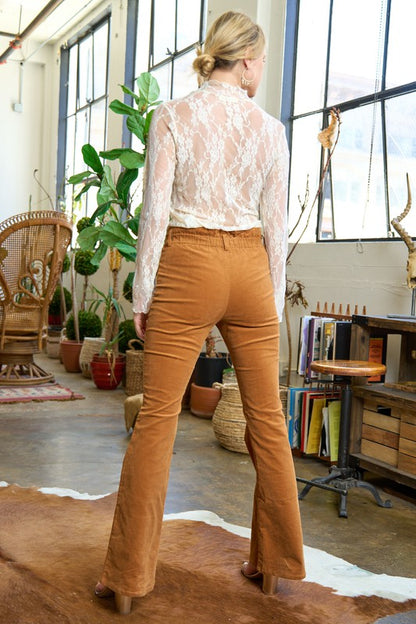 Back view of Taran Plus Size Corduroy Flare Pants in camel with elasticized waistband