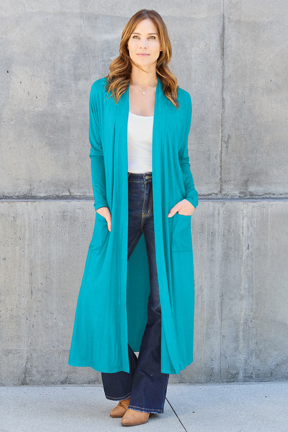 Sky Blue open-front long-sleeve cover-up with a flowy design and pockets, perfect for layering on breezy days.