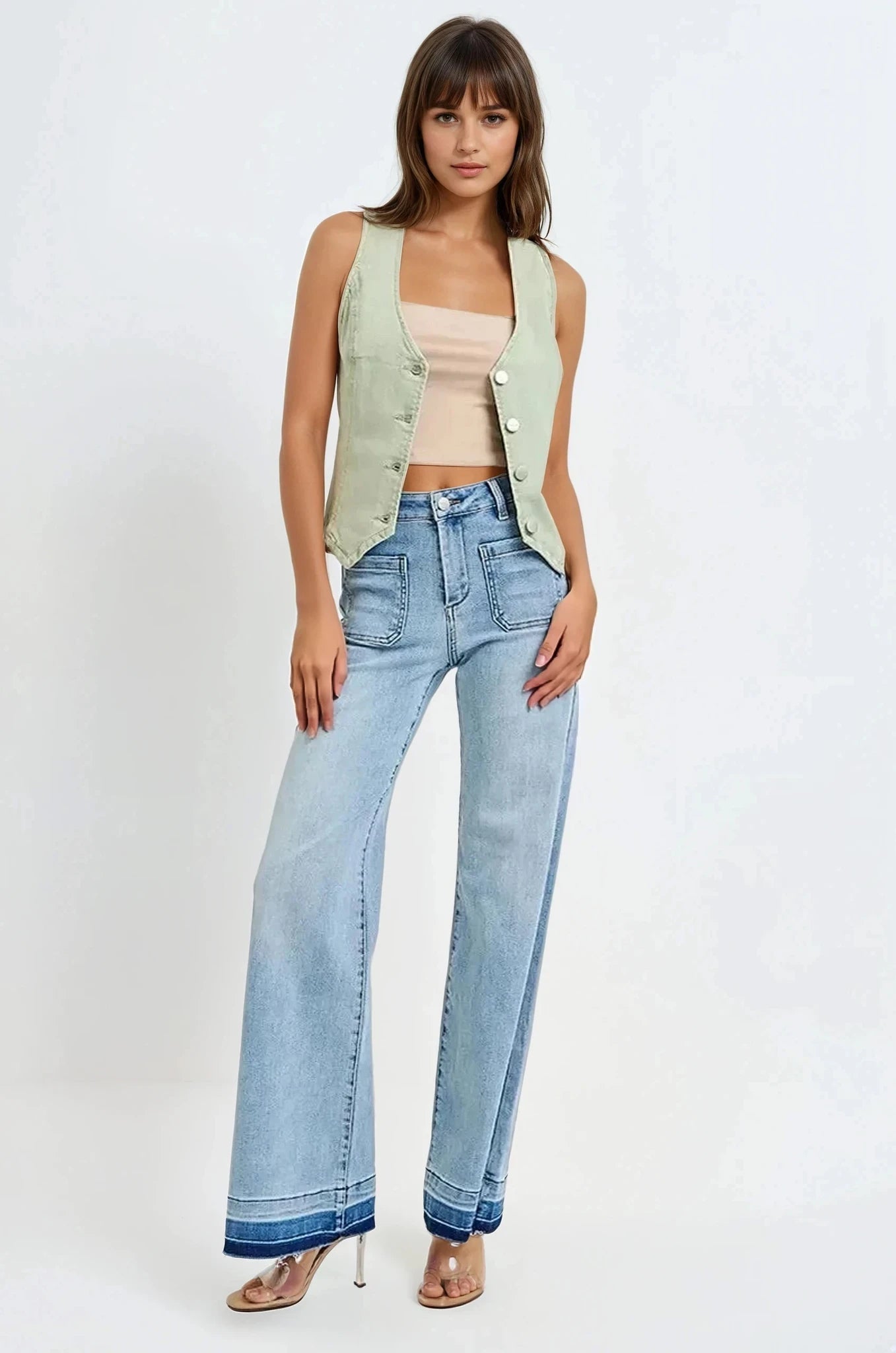 Full body view of model wearing Kaylee Pistachio V-Neck Vest styled for a chic layered look.