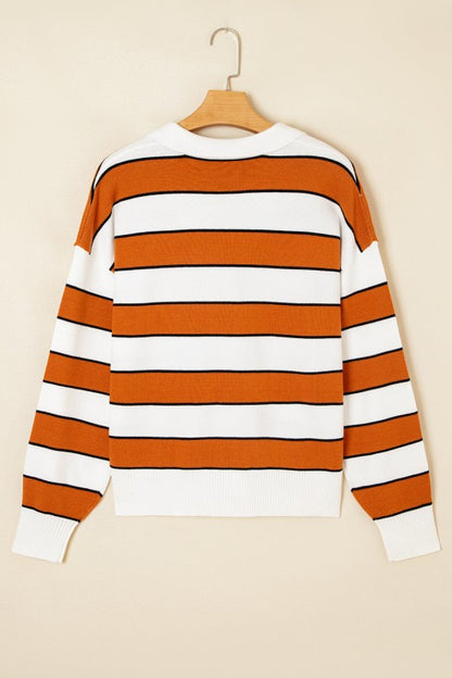 Valeria Stripe Sweater back on hanger showing bold horizontal stripes