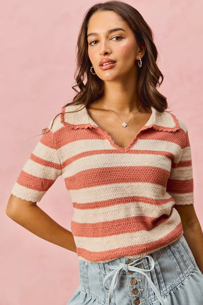 Model wearing Noreen Stripe Short Sleeve Cropped Sweater in cream pink stripes.