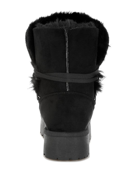 Back view of Black Noaya Chunky Faux Fur Snow Boots with plush collar and sturdy build.