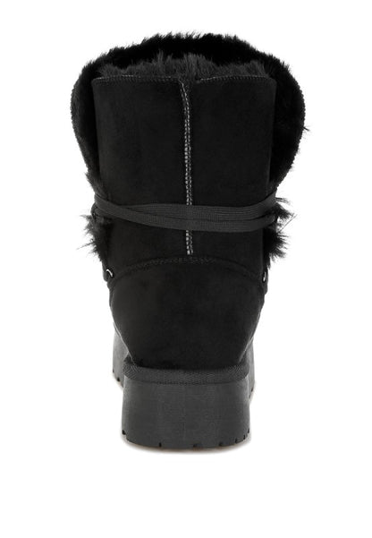 Back view of Black Noaya Chunky Faux Fur Snow Boots with plush collar and sturdy build.