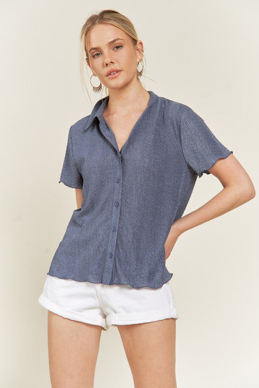 Plus size denim blue Tilda shirt styled with pants, casual wear.