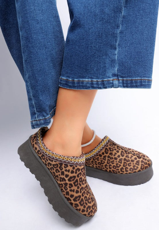 Ottawa Leopard Platform Slip-Ons styled with jeans showing embroidered collar detail.