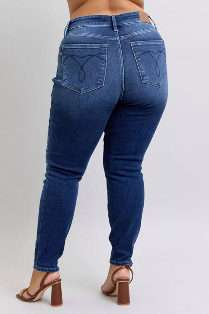 Back view of plus size Glenda Washed Thermal Skinny Jeans with flattering pockets and stretch.