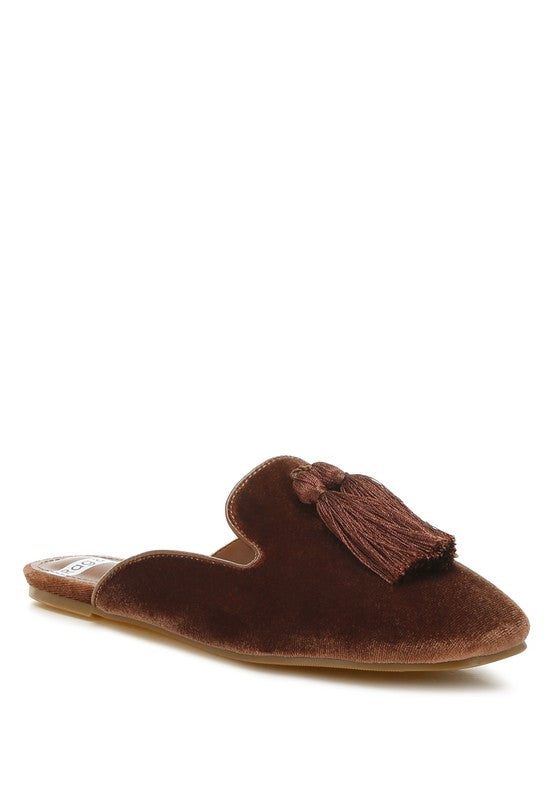 Brown mules with velvet upper and tassel detail.