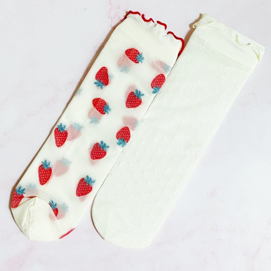 Flat lay of Dots and Strawberries Sheer Socks with red strawberry pair and white dotted pair.