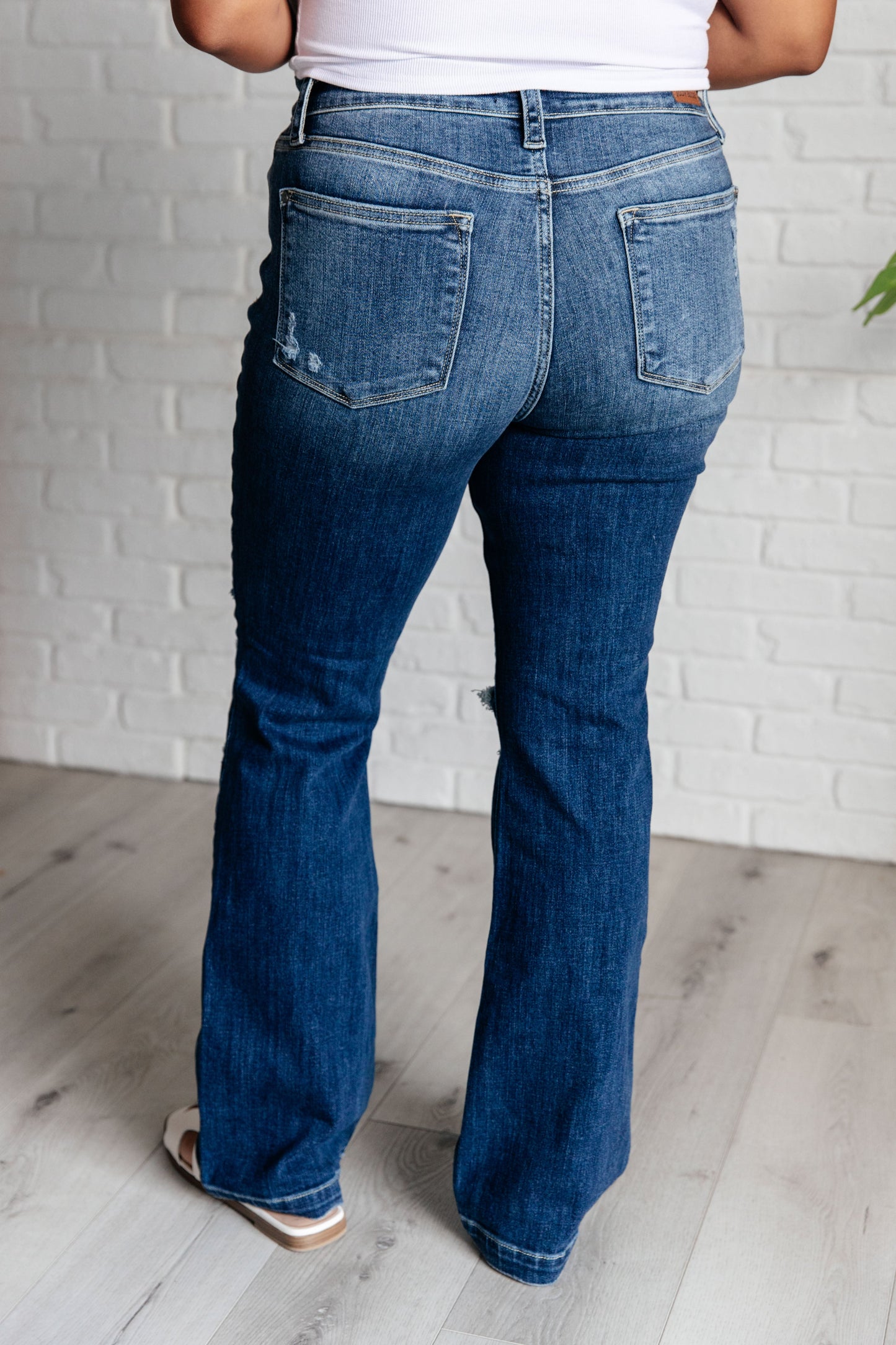 Mila Mid Rise Distressed Bootcut Jeans By Judy Blue