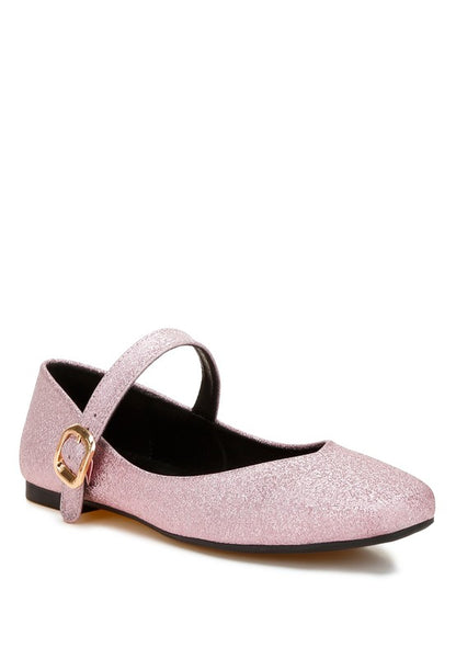 Pink glitter vegan leather ballerinas with square toe and pin buckle strap.