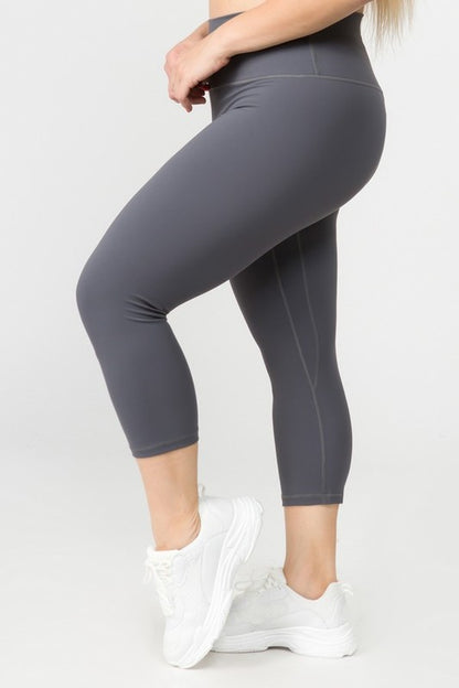 Charcoal plus size Daiva Capri Leggings with 4-way stretch and smooth fit for versatile wear.