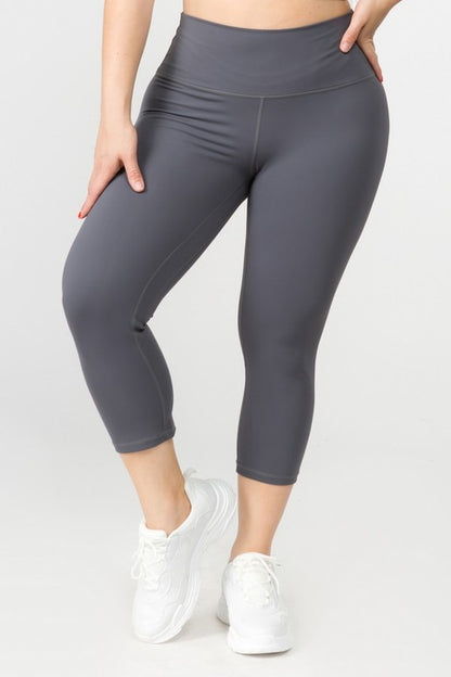 Plus size charcoal Daiva Capri Leggings with high-rise waistband and ultra-soft peach skin finish.