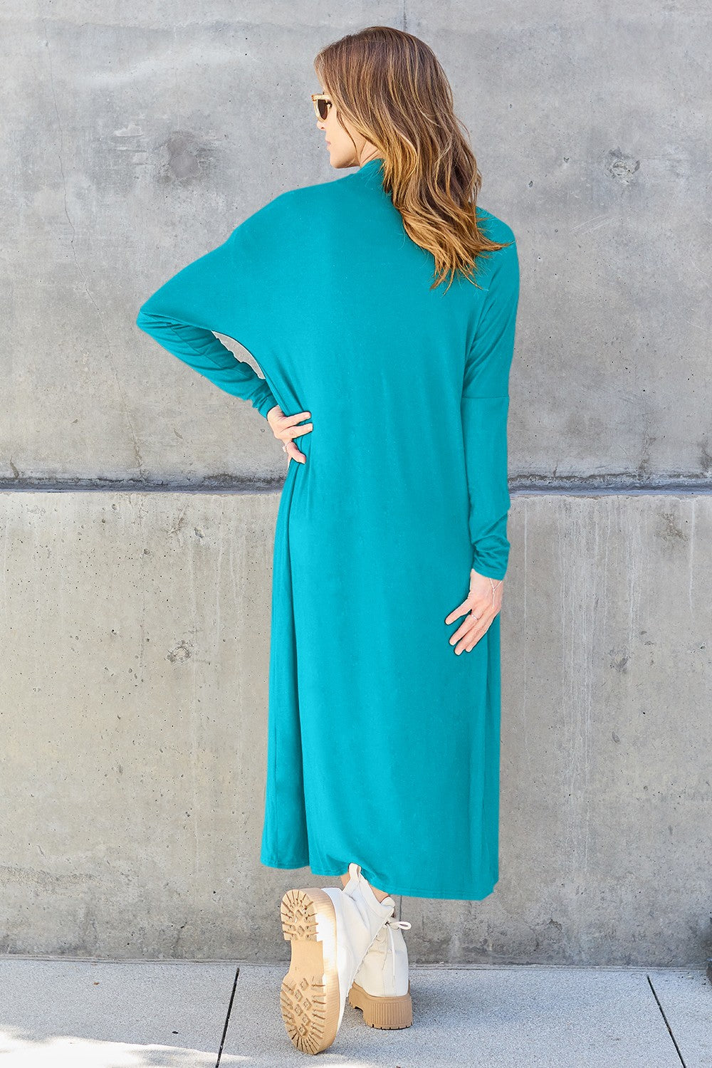 Sky Blue open-front long-sleeve cover-up with a flowy design and pockets, perfect for layering on breezy days.