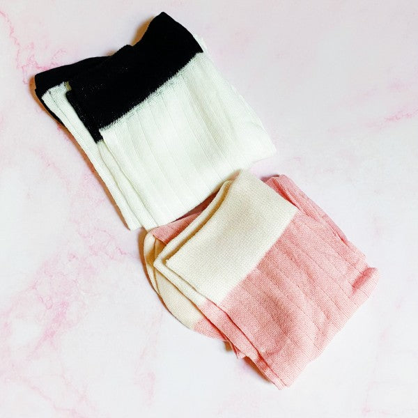 Folded Silky Jacquard Socks set showing pink and white pairs with contrast trim.