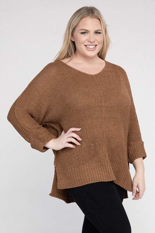 Coco plus size crew neck sweater with a loose fit, side slits, long sleeves, and a cozy knit fabric for warmth.