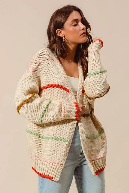 Angelina Cardigan side angle highlighting relaxed oversized fit and stripe accents.