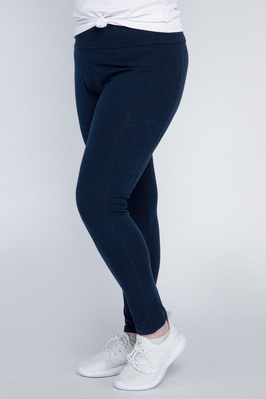 Full-length curvy plus leggings in eclipse blue with a high-rise thick waistband, fitted silhouette, and convenient leg pockets.