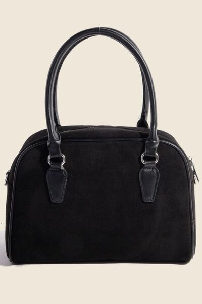 Front view of Flavia faux leather boxy handbag with structured design and medium size.