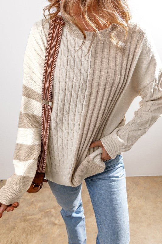 Front angle of Gille Cable Knit Sweater – textured knit patterns