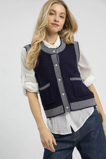 Model wearing Mirren Contrast Striped Trim Button-Down Sweater Vest in navy and cream.