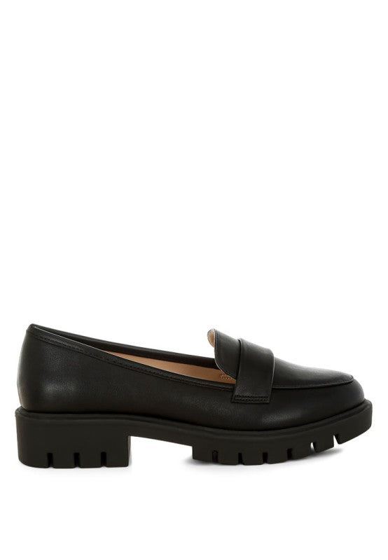 Peridot Chunky Loafers in black highlighting platform low block heel and cushioned fit.