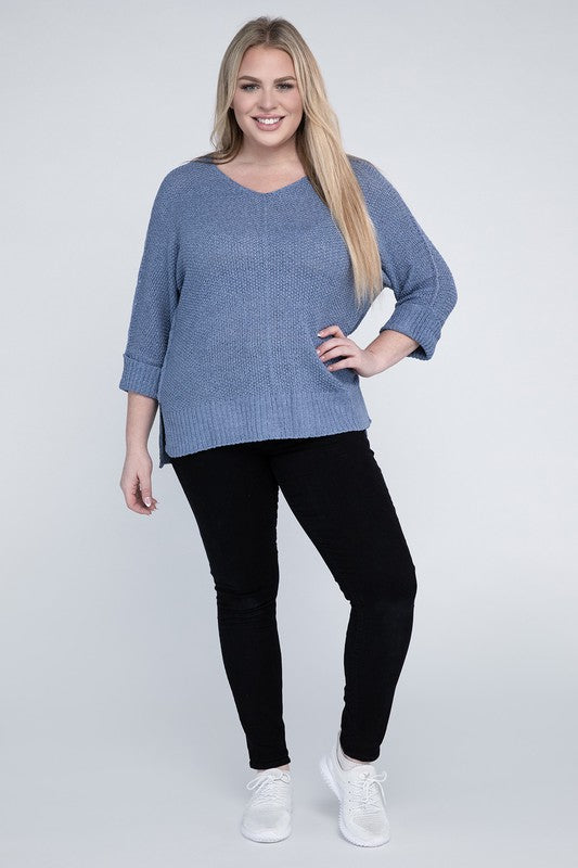 Periwinkle plus size crew neck sweater with a loose fit, long sleeves, and a cozy knit fabric for warmth.