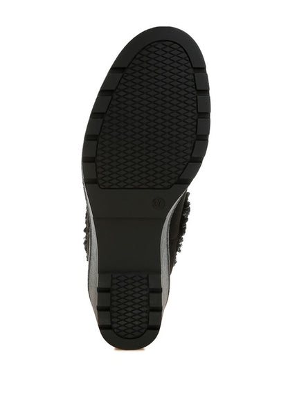 Bottom view of black Thunderhoof Chelsea Boots with durable TPR sole design.