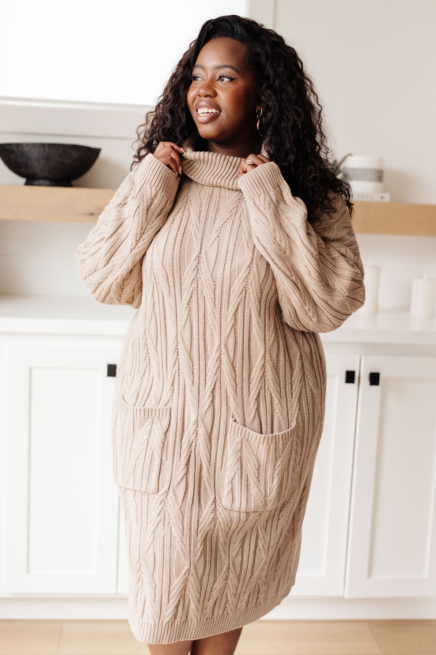 Front view of plus-size Bunny Turtleneck Sweater Dress showing relaxed midi fit and long sleeves.