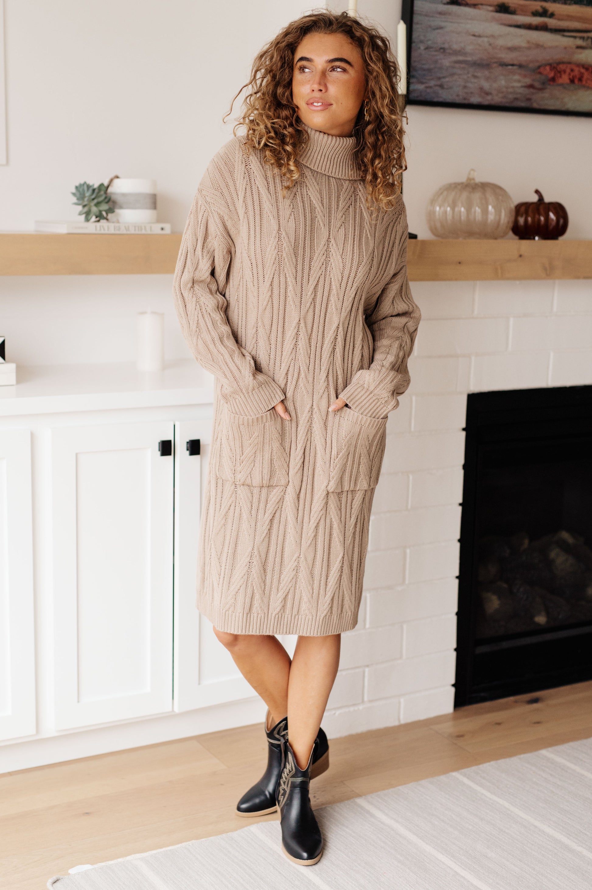 Front view of Bunny Turtleneck Sweater Dress showing cozy cable knit and relaxed midi silhouette.