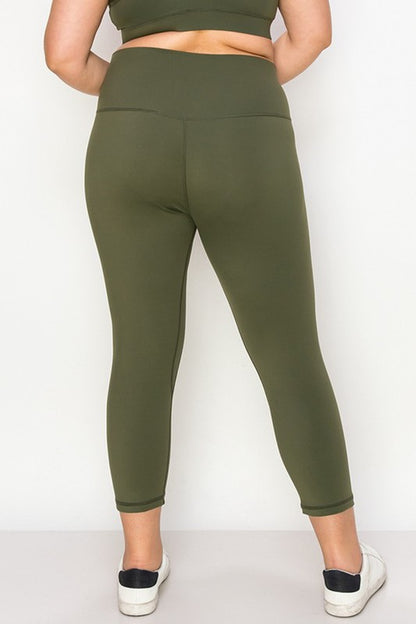 Buttery-soft plus size army green Daiva Capri Leggings with capri length and hidden pocket.