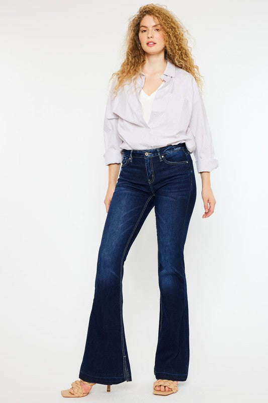 KanCan USA Hester Mid Rise Hem Detail Flare Jeans in dark wash, featuring a button closure, flared leg silhouette, and stylish hem detailing.