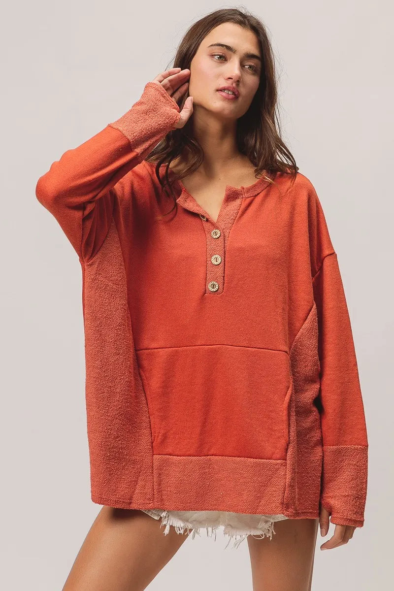 Front view of Hayden French Terry Knit Henley with button accents and relaxed silhouette