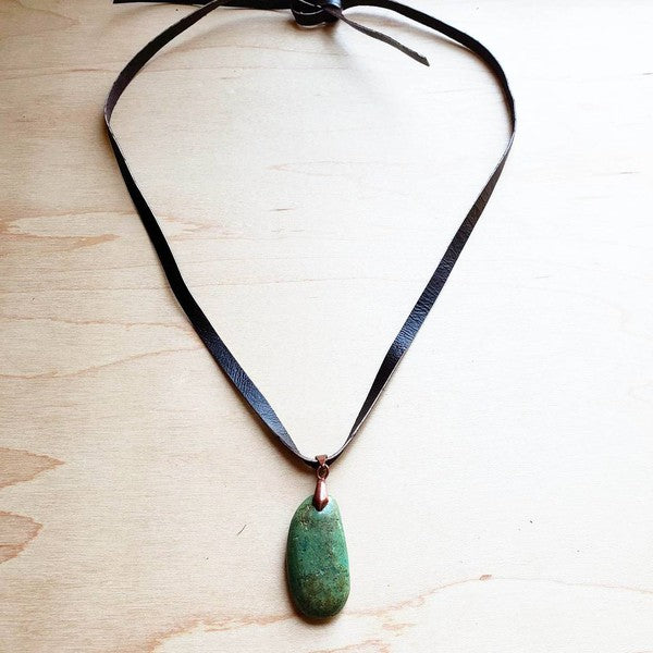 Turquoise pendant necklace with a leather cord, adjustable self-tie closure, and unique pendant size ranging from 1 to 2 inches.