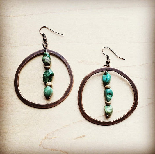 Copper hoop earrings with natural turquoise and wood accents, about 2" long. 