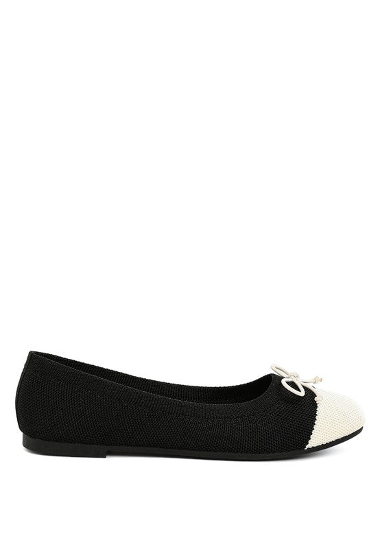Side angle view of Rosario Two Tone Ballerinas in black and white with breathable knit upper