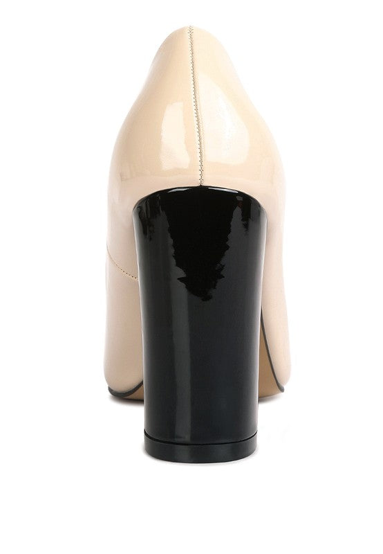 Back view of nude Kamira Patent Pumps with high block heel.